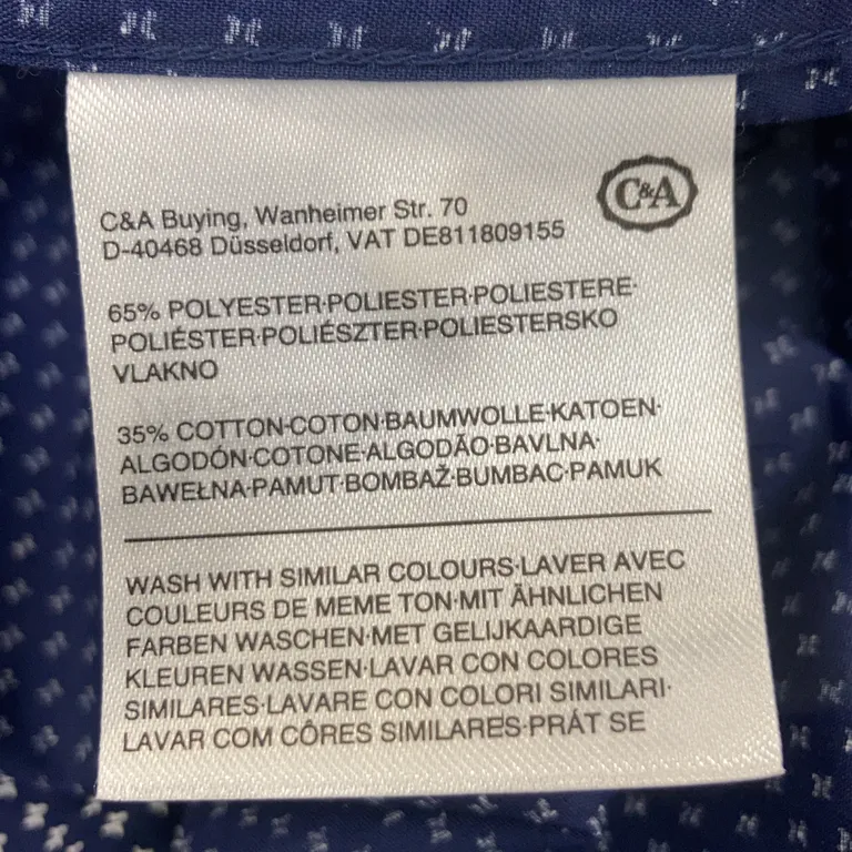 Skjorta (Blå) från Canada  Bomull, Polyester - Materialetikett