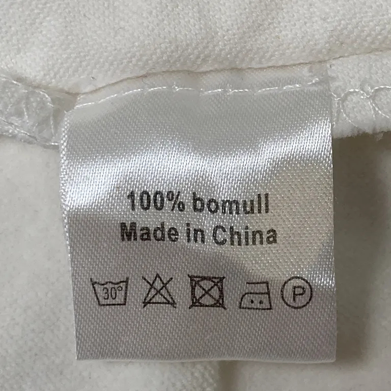 Kuddfodral (Vit) från Mio Bomull - Materialetikett