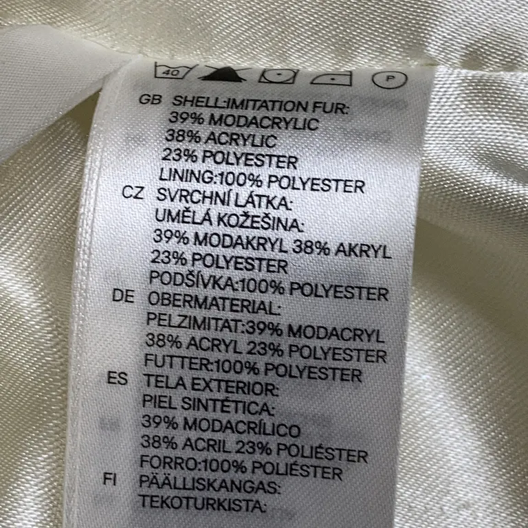 Bolero (Vit) från H&M Päls, Polyester, Akryl - Materialetikett