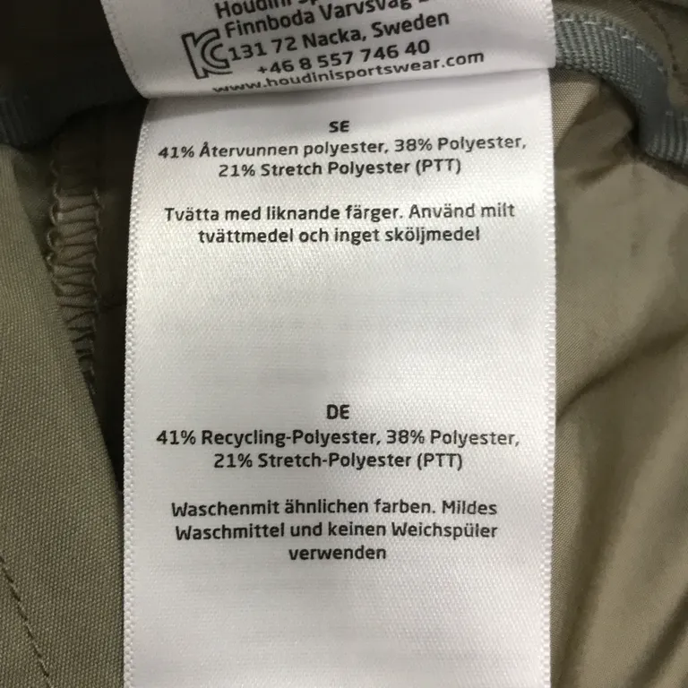 Chinos (M's Commitment Chinos) från Houdini Polyester - Materialetikett