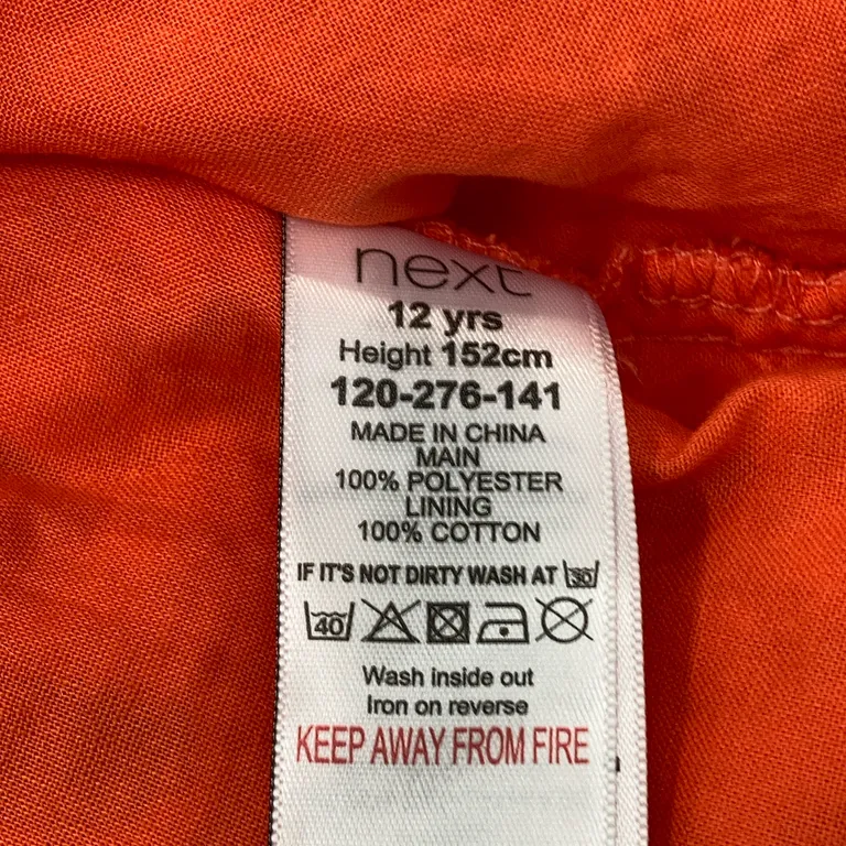 Klänning (Orange) från I Love Next Bomull, Polyester - Materialetikett