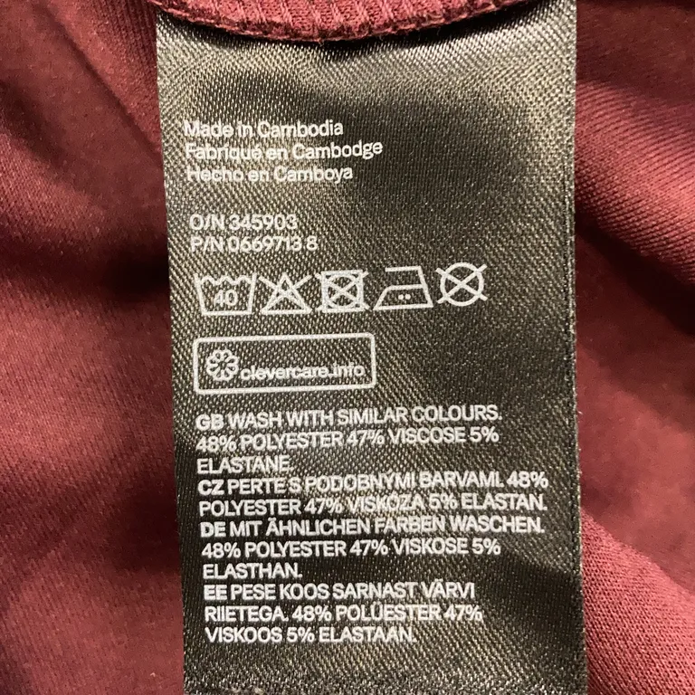 Tröja (Röd) från H&M Polyester, Viskos, Elastan - Materialetikett