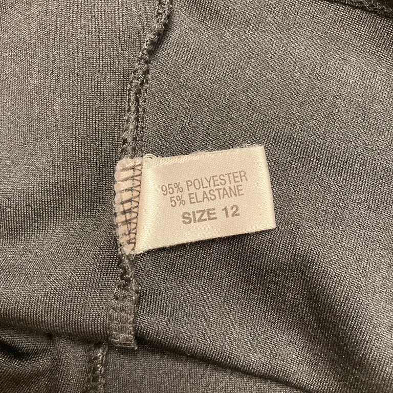 Topp (Svart) från Smooche Polyester, Elastan - Materialetikett