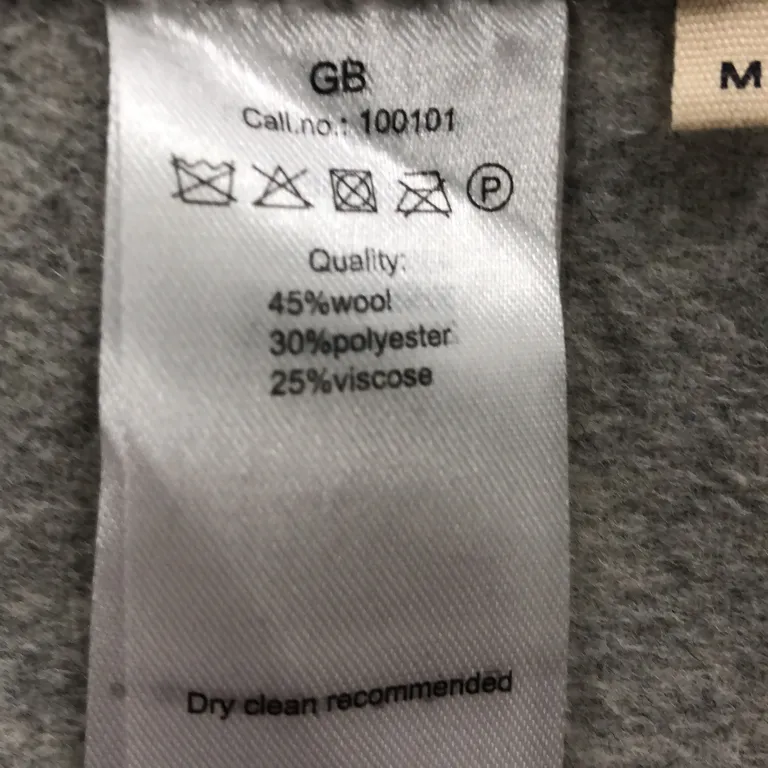 Kappa (Grå) från Levate Viskos, Ull, Polyester - Materialetikett