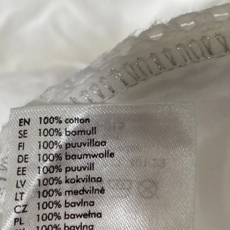 Dopklänning (Vit) från Lindex Bomull - Materialetikett