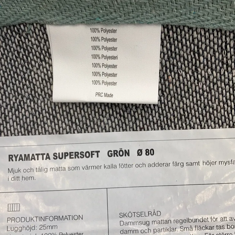 Kortluggad matta (Grön) från Bauhaus Polyester - Materialetikett