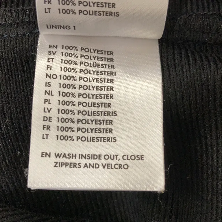 Jacka (Vindfleece) från Polarn O. Pyret Polyester - Materialetikett