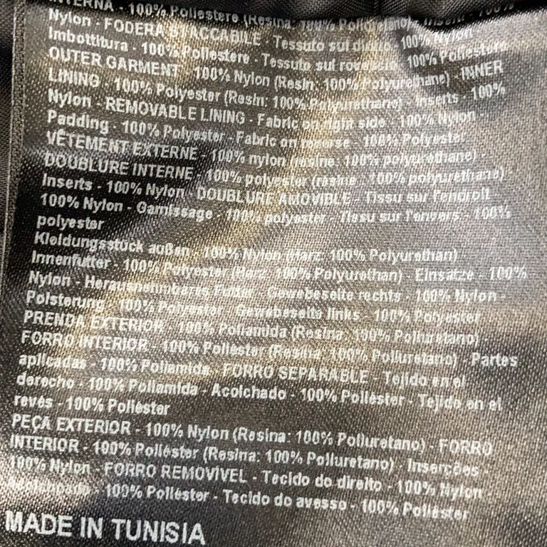 Byxor (Svart) från Dainese Nylon, Polyester, Polyuretan - Materialetikett