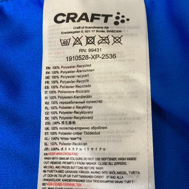 Cykeltröja (Blå, Flerfärgad) från Craft Polyester - Materialetikett