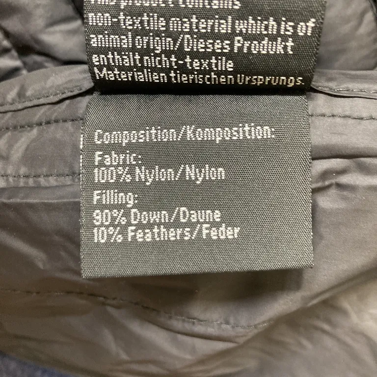 Jacka (Blå) från Modström Nylon, Dun - Materialetikett
