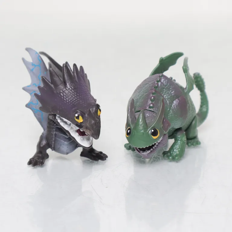Leksaksfigur (DRAKTRÄNAREN) från DWA LLC